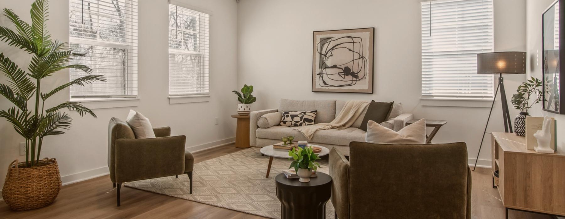 The Harris townhome living room with a couch and chairs