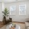 Furnished living room with a couch and a coffee table in townhome at The Harris