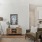 Furnished living room next to kitchen in townhome at The Harris