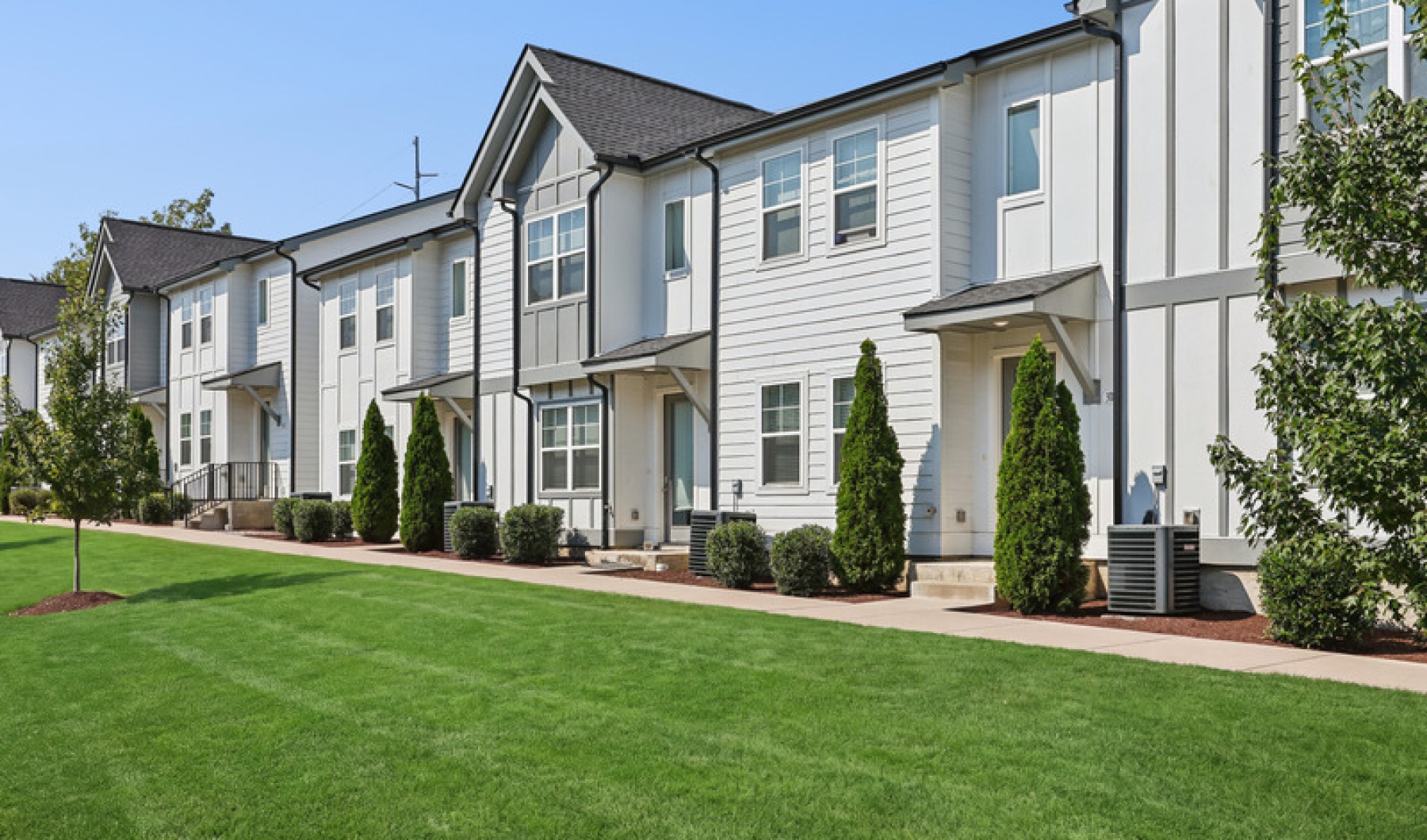 Townhome neighborhood, showing townhome exteriors and sidewalks